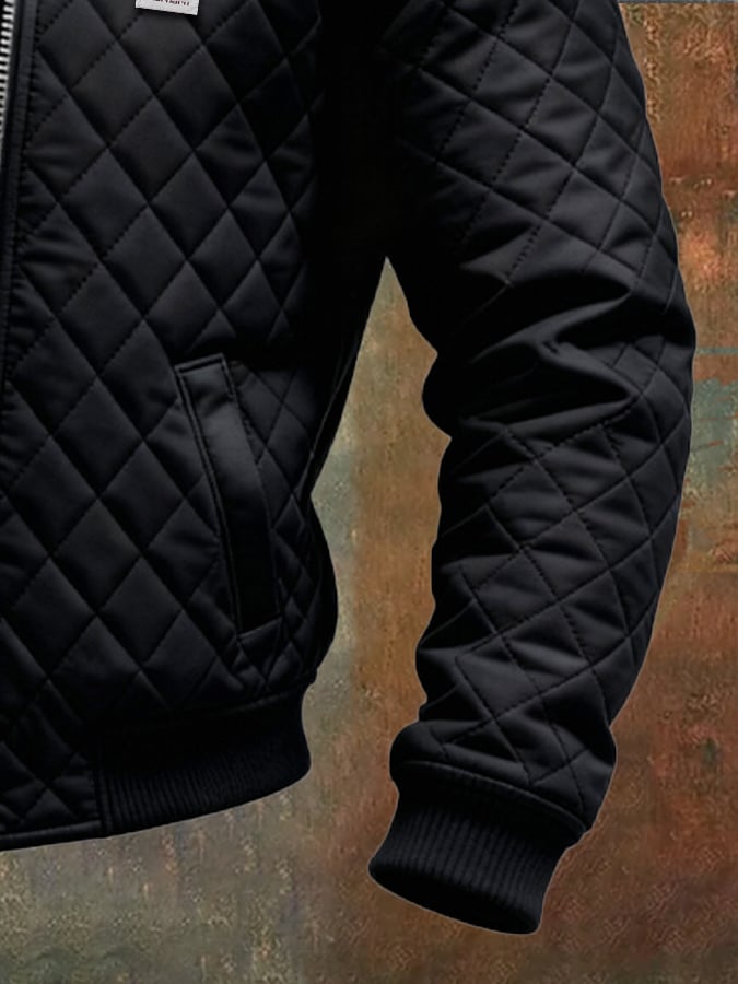 SCHWARZE STEPPJACKE MIT LEDER-SCHULTERN